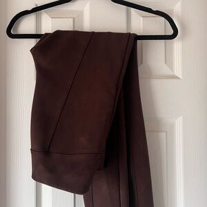 Anthropologie velvet stretch pants with zipper adjustable flare bottoms. Size 27